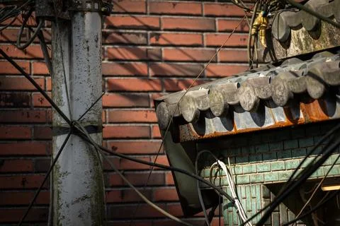 Weathered Eaves and Brick Wall Detail Stock Photos