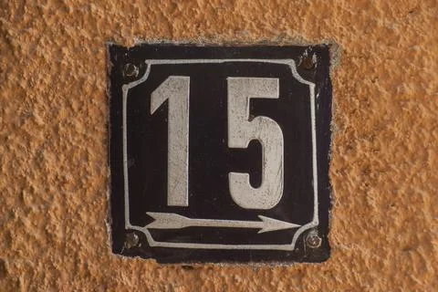 Weathered enamelled plate number 15 Stock Photos
