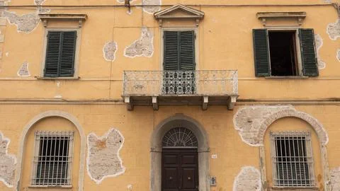 The weathered faade of a typical old Italian building Stock Photos