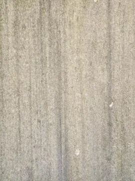 Weathered gray concrete wall texture background with stains and scratches for Stock Photos