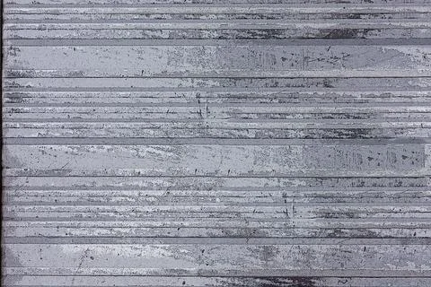 Weathered gray metallic shutter creating a textured background Stock Photos