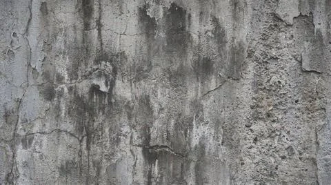 Weathered gray stone wall texture background. Fotos Stock