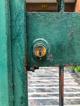 Weathered Green Gate Lock Stock Photos