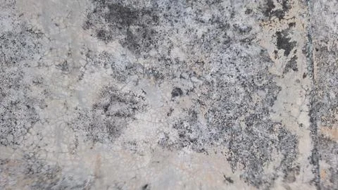 Weathered grey concrete wall texture with cracked surface pattern Stock Photos