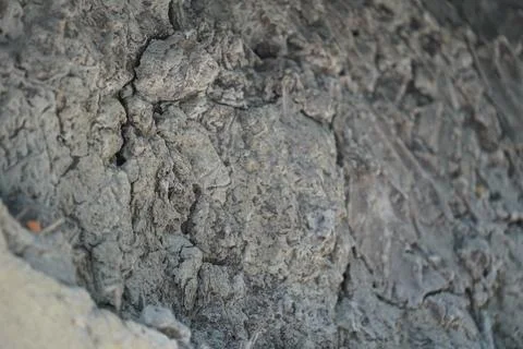 Weathered Grey Stone Texture with Natural Cracks and Rough Surface Stock Photos