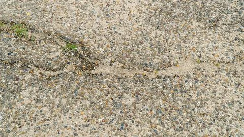 Weathered Ground Path with Moss in Crack and Pebbles 写真素材