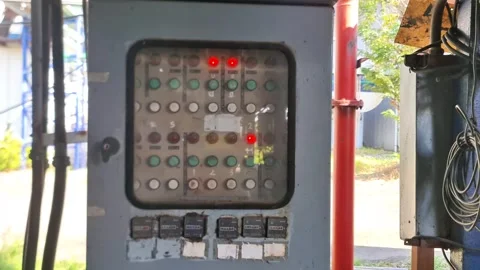 Weathered industrial control panel box with rusty details, buttons, and analog Stock Footage 337675629