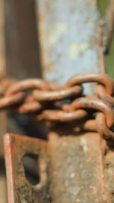 Weathered iron chain with rustic rugged patina and texture, Closeup of aged Stock Footage 329470406