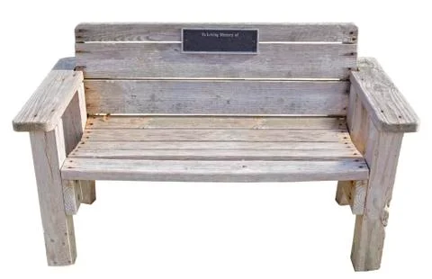 Weathered memorial bench Stock Photos