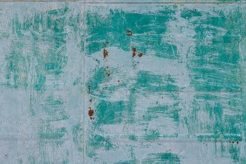 Weathered metal surface with rust and texture on outdoor wall Foto stock