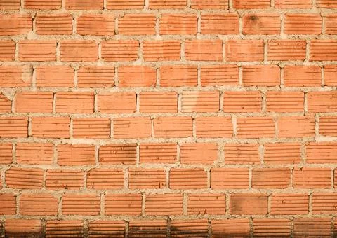 Weathered old brick wall texture background. Stock Photos