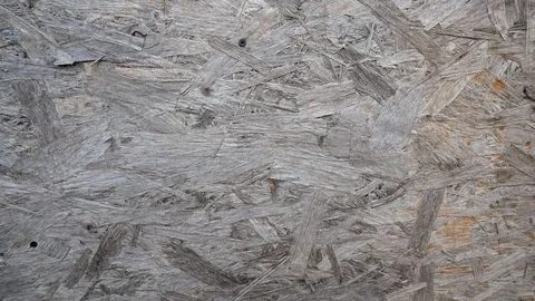 Weathered Osb wall close up tilt shot Stock Footage 125867638