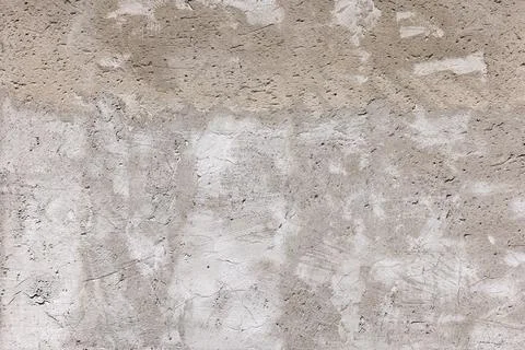 Weathered outdoor wall surface in daylight Stockfoto's