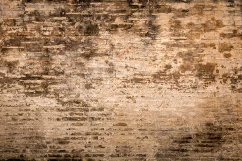 Weathered plaster and brick wall textured background Stock Photos