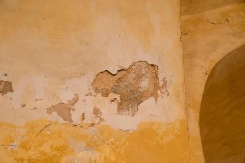 Weathered Plaster Wall Texture in Historic Fortress Interior Stock Photos
