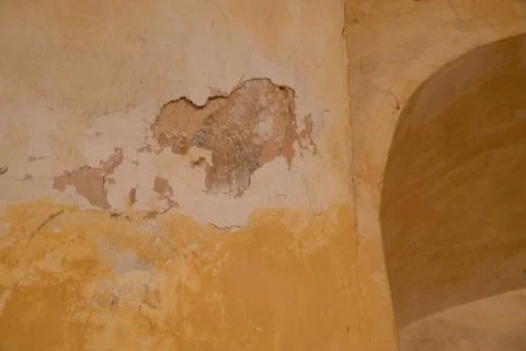 Weathered Plaster Wall Texture in Historic Fortress Interior Stock Photos