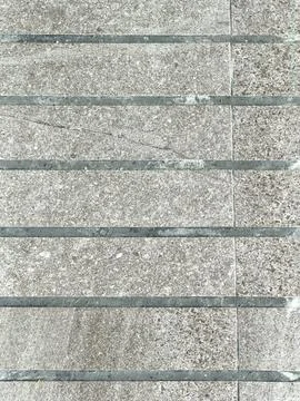 Weathered Rectangular Pavement Tiles with Dark Grout Lines Stock Photos