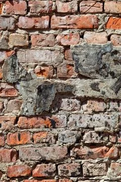 Weathered red brick wall as background Stock Photos