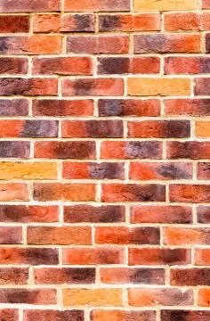 Weathered red brick wall as background texture Stock Photos