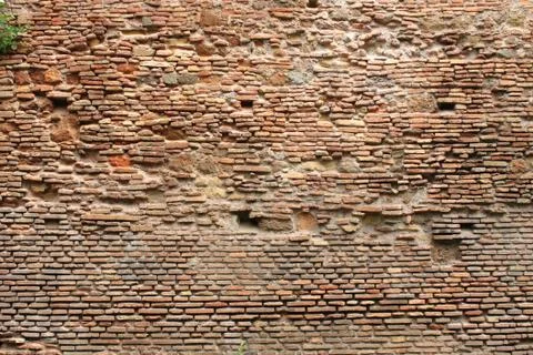 Weathered red brick wall Stock Photos