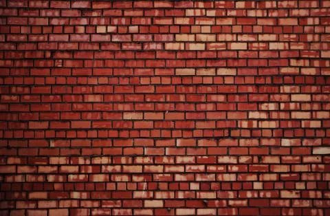 Weathered red brick wall surface background rexture Stock Photos