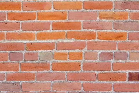 Weathered red brick wall surface texture Stock Photos