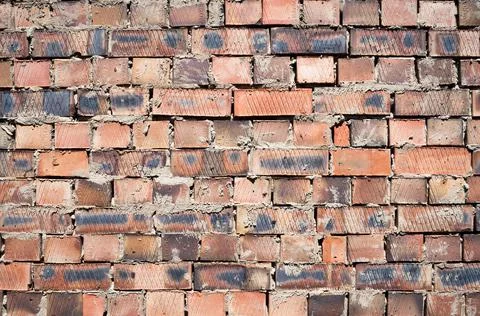Weathered red brick wall texture seamlessly tileable Stock Photos