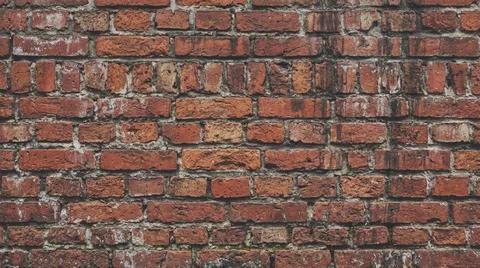 Weathered Red Brick Wall Texture Background Close Up. Fotos Stock