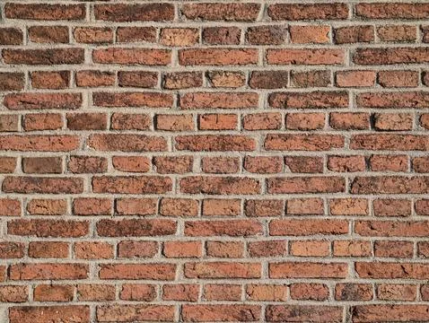 Weathered red brick wall texture with horizontal mortar joints, rough surfa.. 库存照片