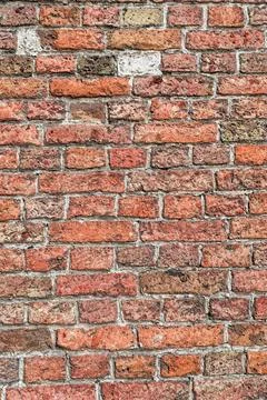 Weathered red brick wall texture for background Stock Photos