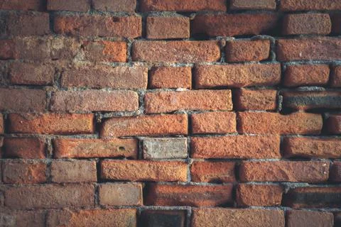 Weathered red bricks wall texture. Building stone surface background. Stock Photos