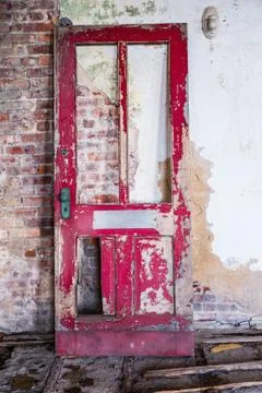 Weathered red door Stock Photos
