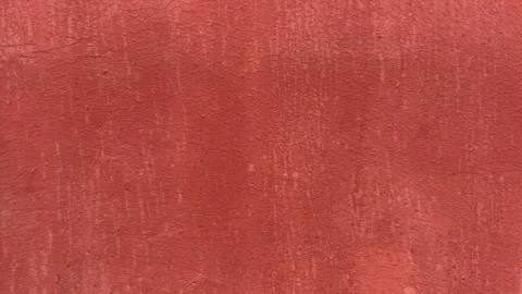 Weathered Red Wall Texture with Natural Wear and Patina Stock Footage 331048820