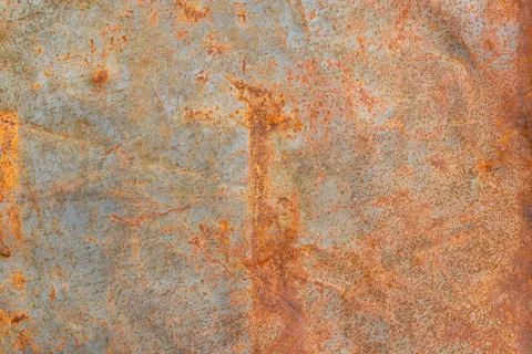 Weathered rusted flat grey metal surface in industrial outdoor setting Photos
