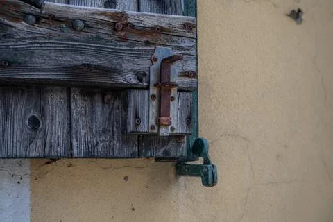 Weathered Shutter with Rusty Latch Stock Photos