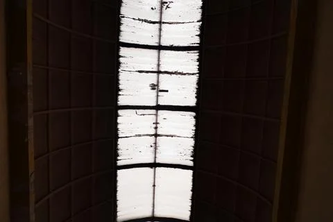Weathered Skylight Panels with Dark Frame Viewed from Below in Shopping Mall Stock Photos