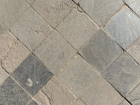 Weathered Square Stone Paver Texture with Diagonal Pattern Stock Photos