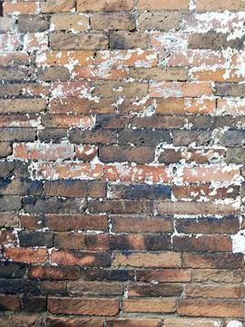 Weathered stone wall in close up Stock Photos