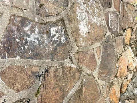 Weathered Stone Wall Texture with Natural Patterns Stock Photos