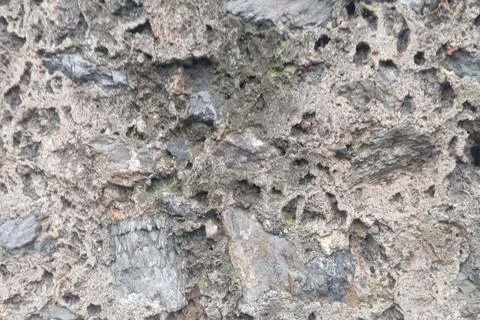 Weathered Stone Wall Texture – Rough Natural Rock Surface Fotos de archivo