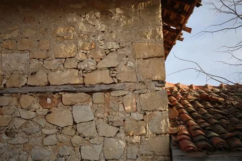 Weathered stone wall texture. Texture of natural stone wall Stock Photos