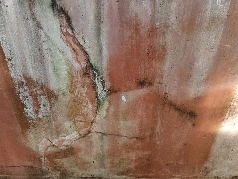 Weathered terracotta cement wall surface Stock Photos