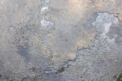 Weathered texture of a damaged surface in natural light 库存照片