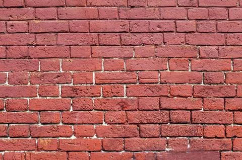 Weathered texture of stained old red brick wall background Stock Photos