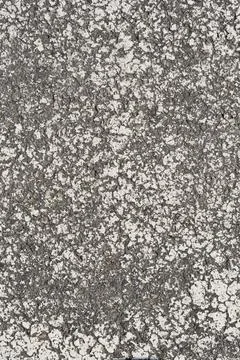 Weathered white paint texture on asphalt surface Stock Photos