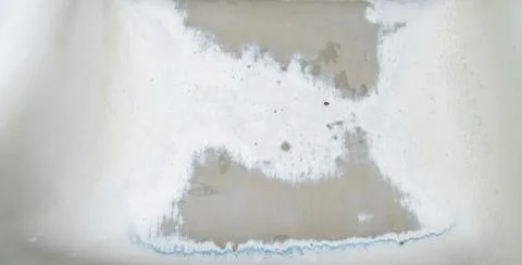 Weathered White Painted Curved Surface with Water Stains 写真素材
