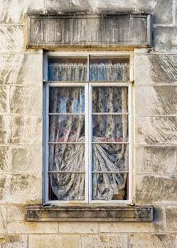 Weathered Window in a Limestone Wall Stock Photos