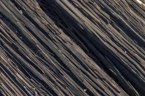 Weathered wood planks forming an abstract diagonal pattern 스톡 사진