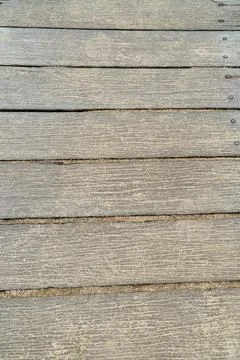 Weathered Wooden Plank Path Surface with Bolts and Sand Stock Photos