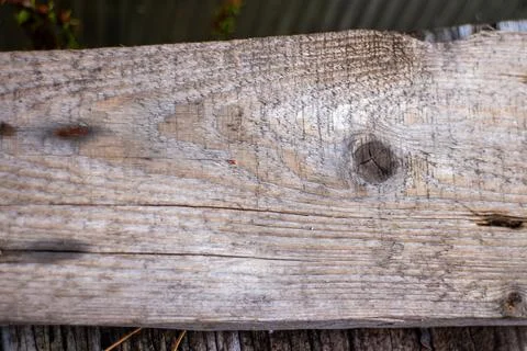 Weathered wooden plank surface texture with natural grain patterns 库存照片